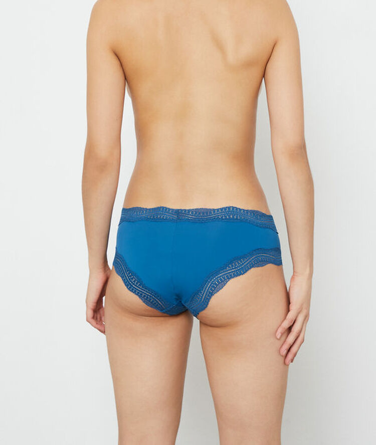 Shorty met boordjes in grafisch kant felblauw.
