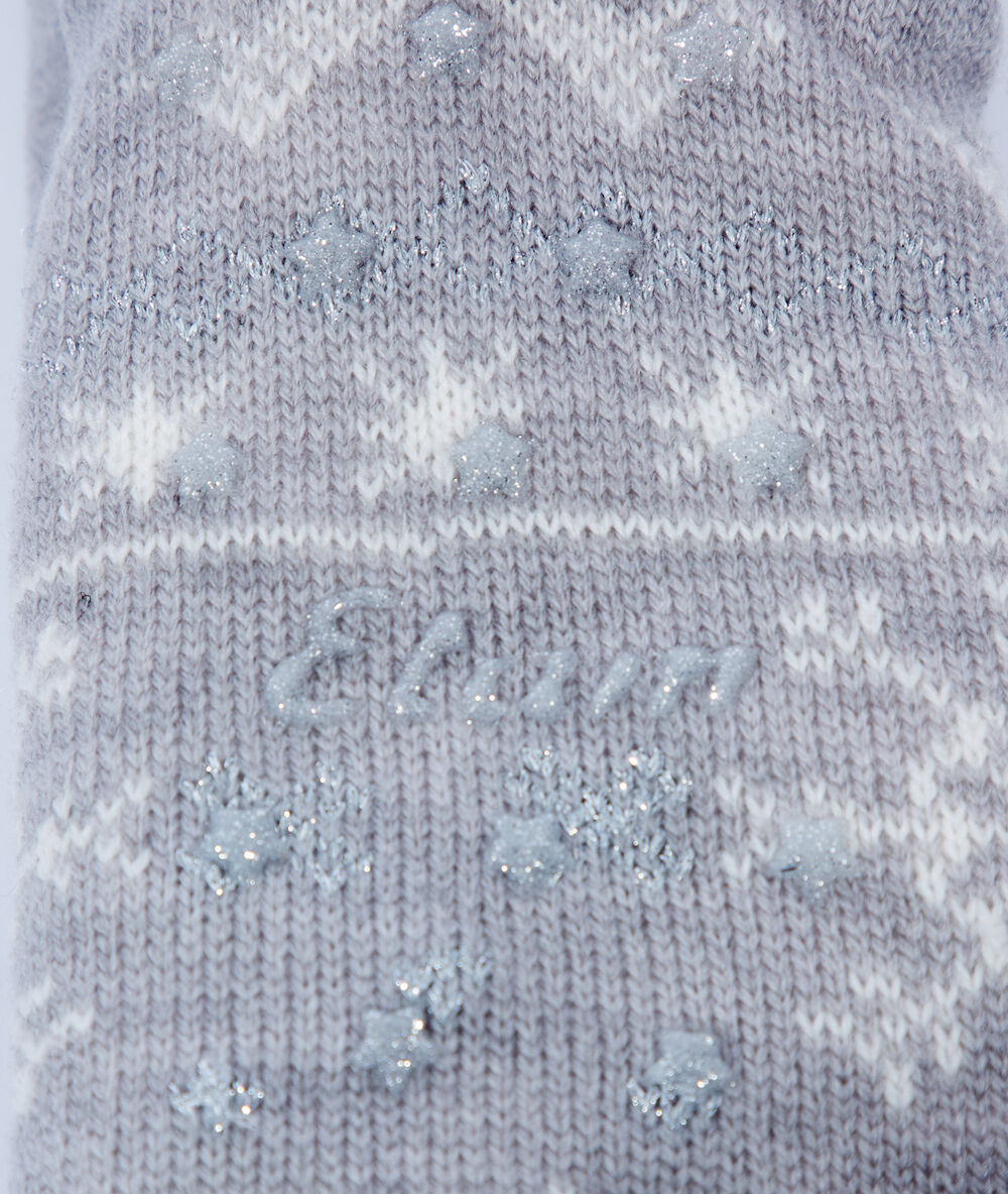 Chaussettes homewear nouées à motifs gris.