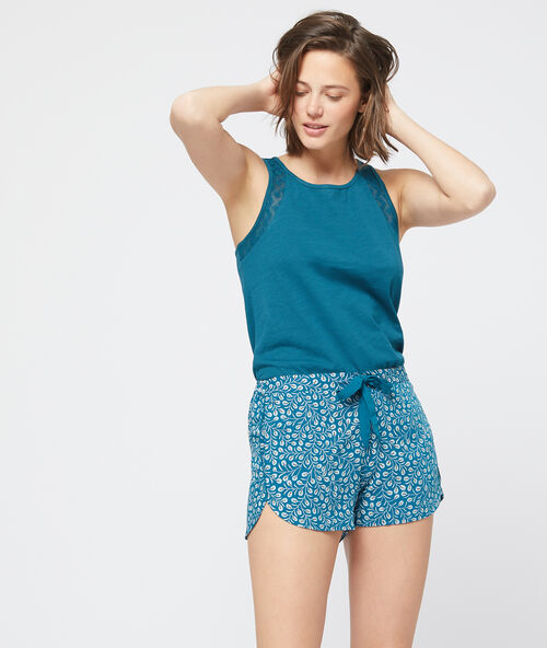 Short imprim&eacute; feuillage bleu petrole.