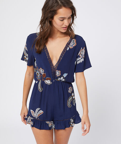 Playsuit met bloemenprint blauw.