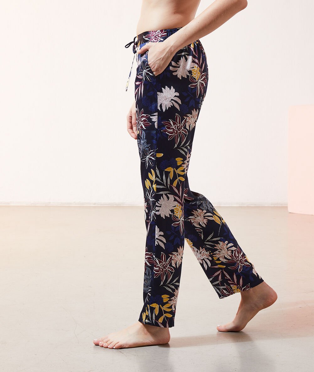 Gesatineerde broek met print marine.