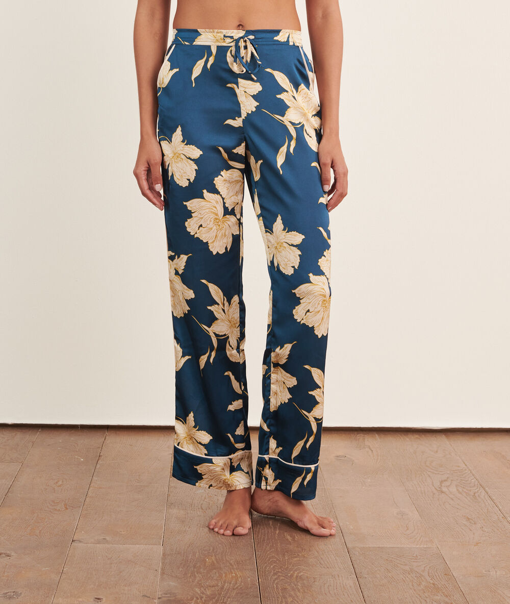 Pantalon met print petrol blauw.