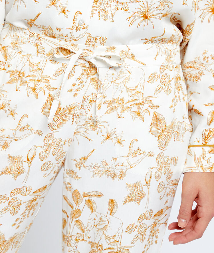 Broek met print ecru.