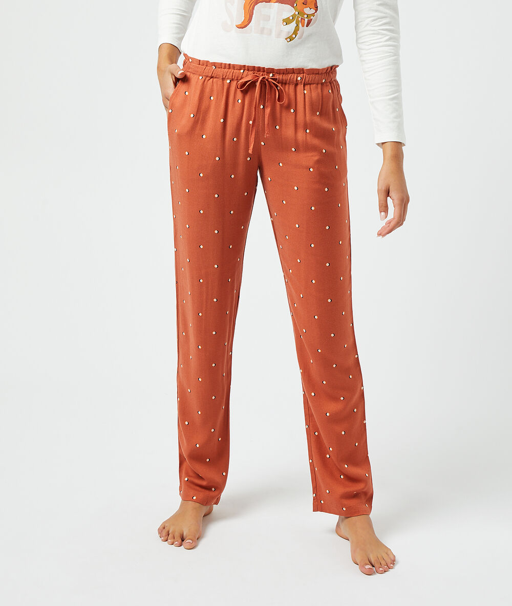 Pantalon met print terracotta rood.