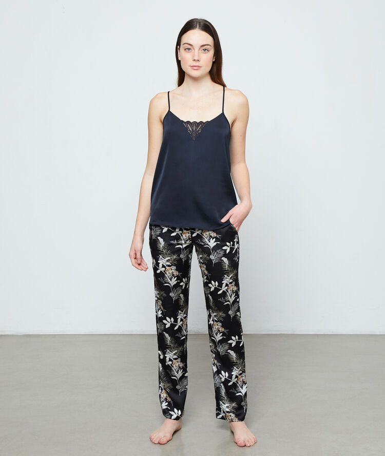 Pantalon imprimé feuillage noir.