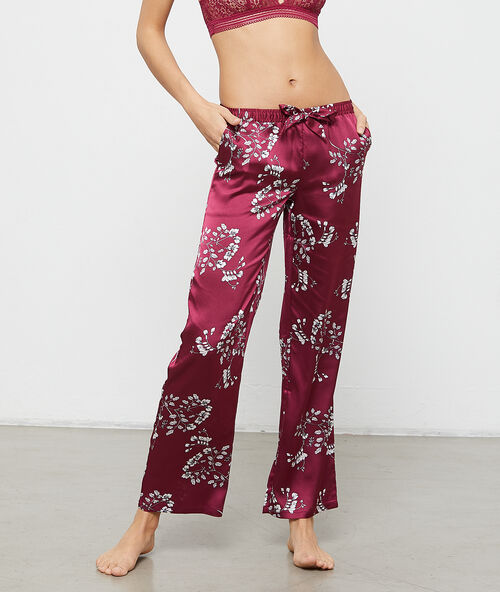 Satijnen pantalon met bloemenprint bordeaux.