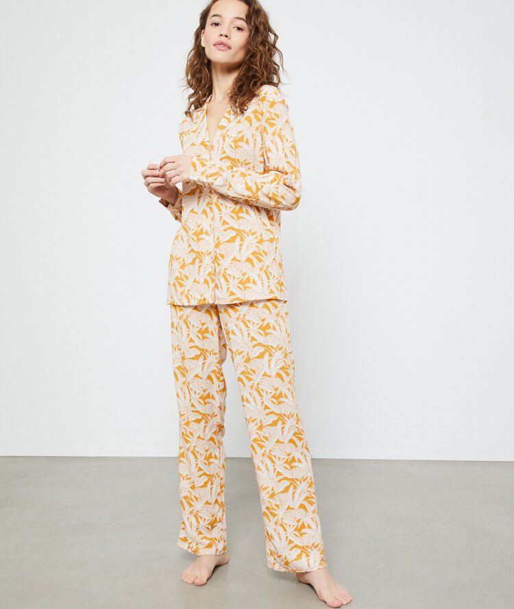 Broek met botanical print okergeel.