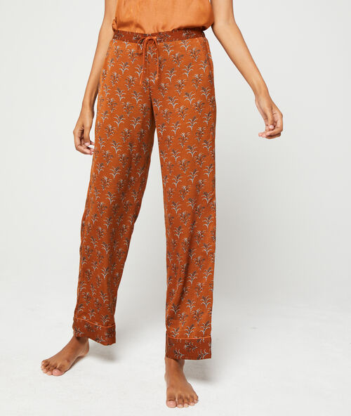 Pantalon imprim&eacute; ocre.