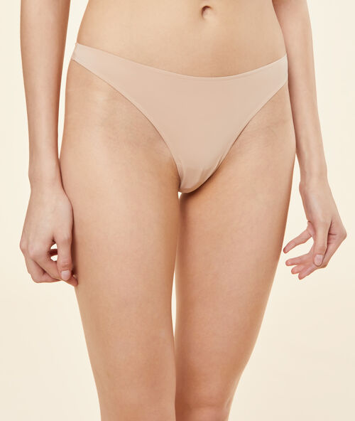 Tanga micro et tulle beige/ peau.