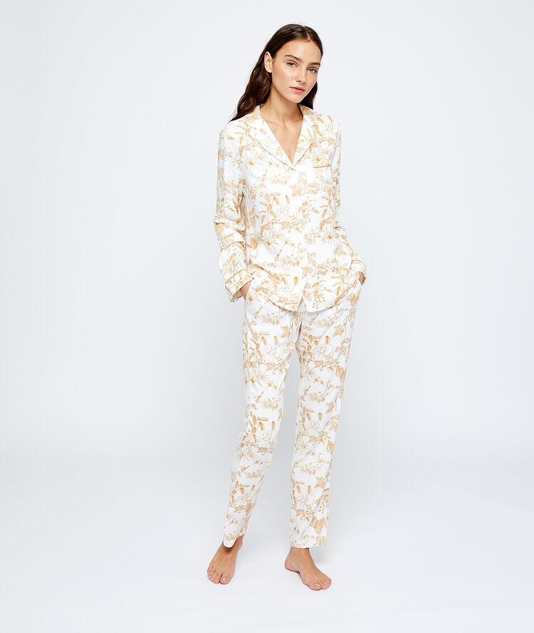 Broek met print ecru.