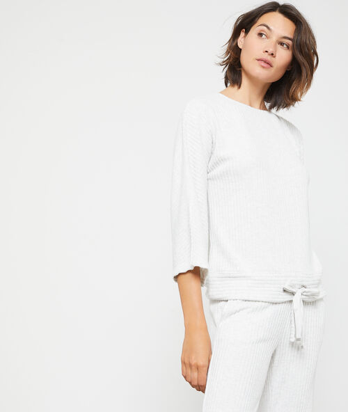 Corduroy trui in fijne mesh ecru.