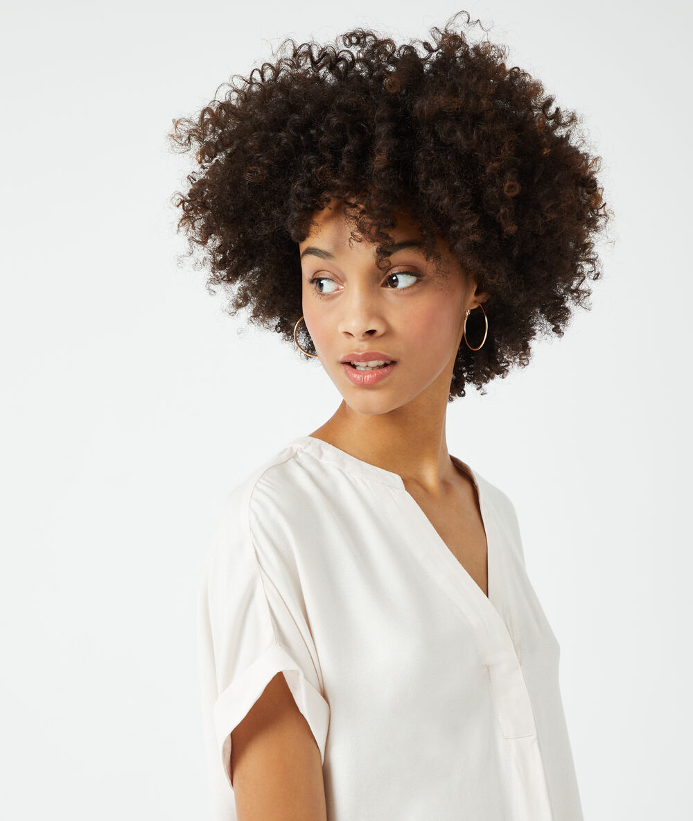 Effen blouse beige roze.