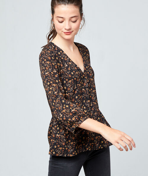 Blouse &agrave; imprim&eacute; fleuri noir.