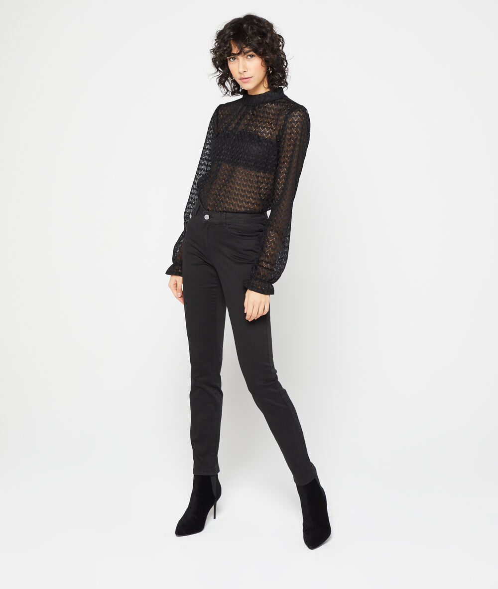 Pantalon slim en coton noir.