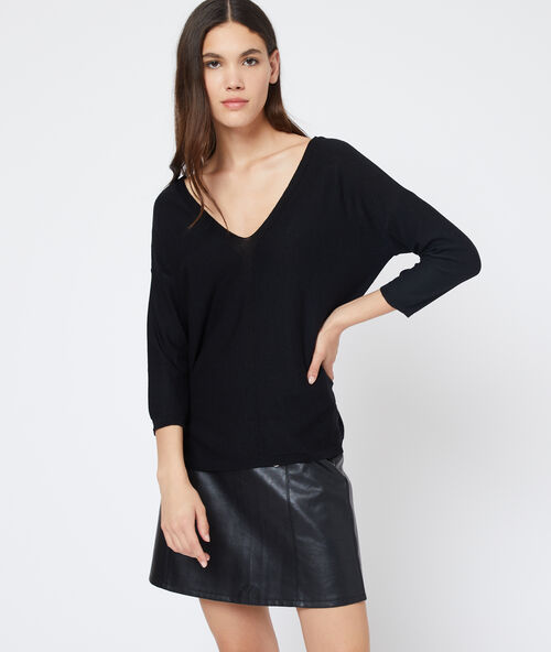 Trui met kanten rugdecollet&eacute; zwart.