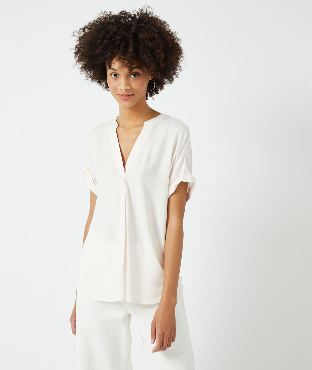 Effen blouse beige roze.