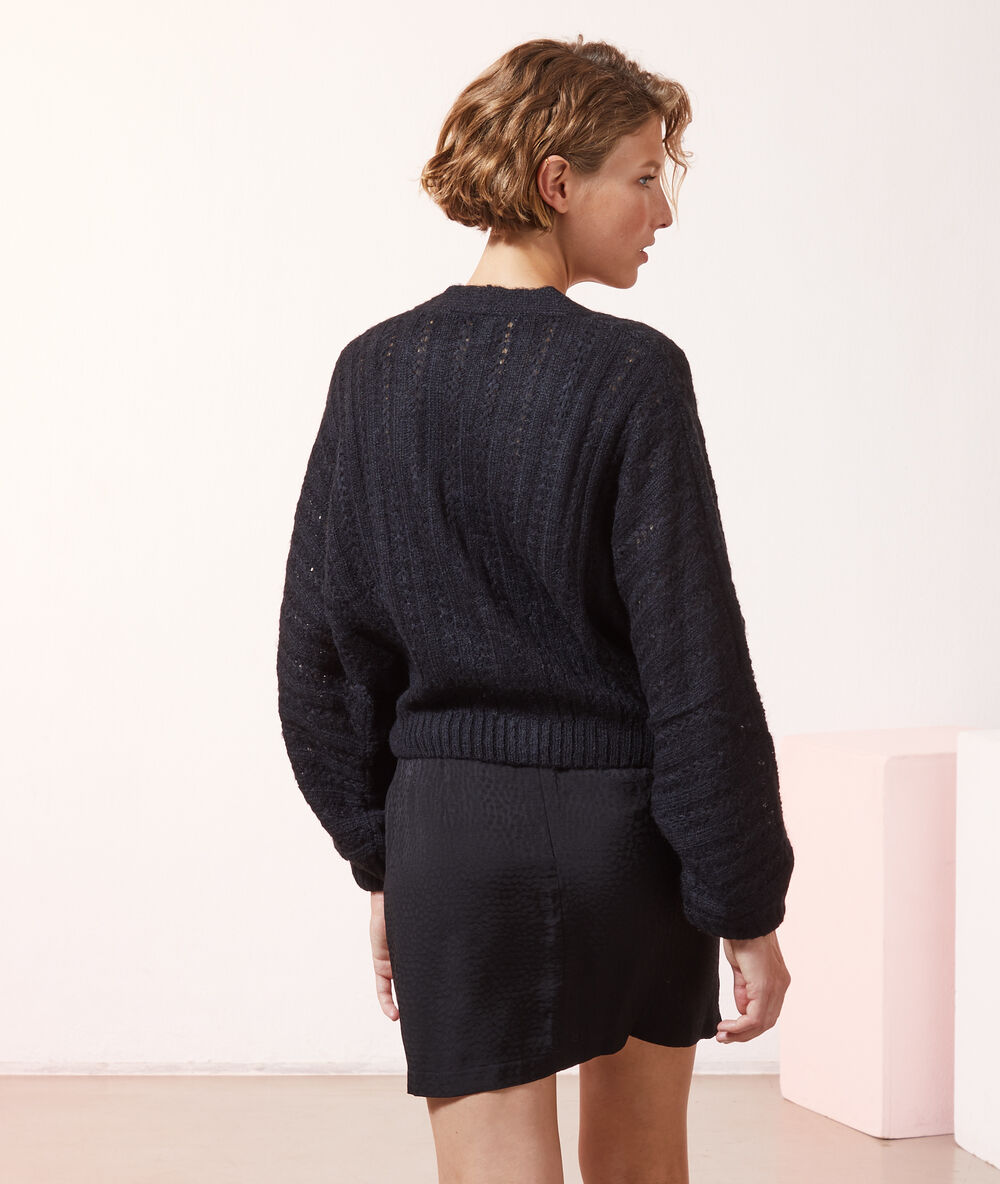 Gilet ample noir.