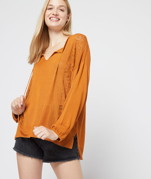 Trui in fijne mesh en guipurekant specerij.