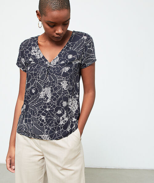 T-shirt &agrave; imprim&eacute; fleuri noir.