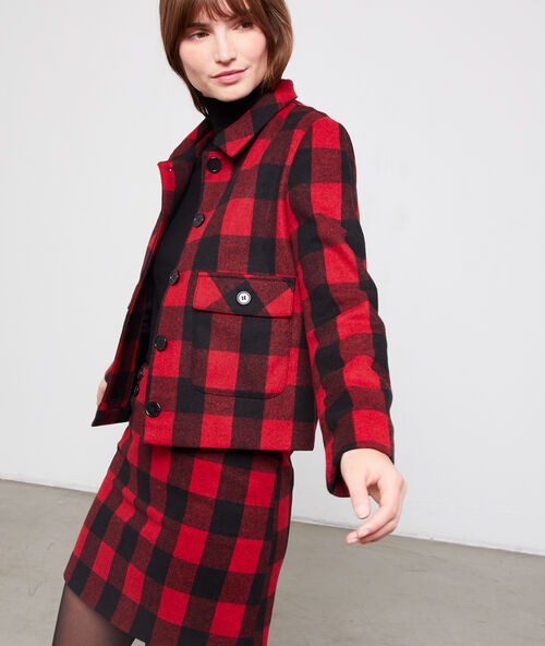 Veste &agrave; carreaux noir.