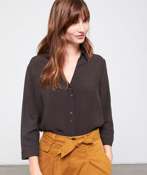 Blouse met amber knopen brons.