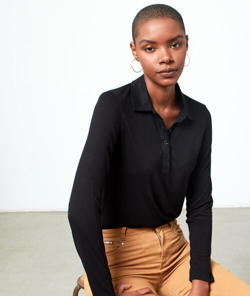 Polo &agrave; manches longues en coton noir.