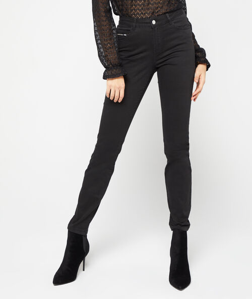 Pantalon slim en coton noir.