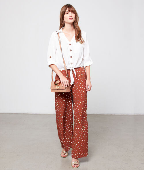 Petit sac rigide iris&eacute; fa&ccedil;on serpent beige rose.