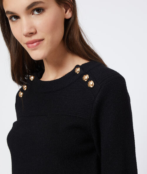 Pull &agrave; boutons en maille fine noir.