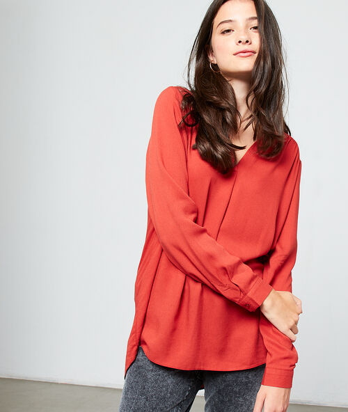 Blouse col v rouille.