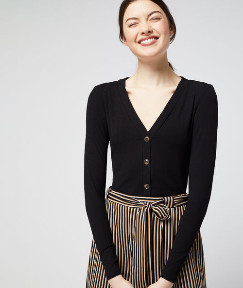 Corduroy t-shirt met knopen zwart.