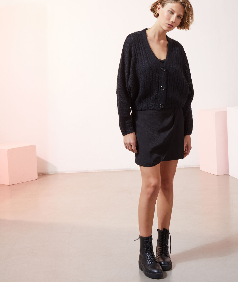 Gilet ample noir.