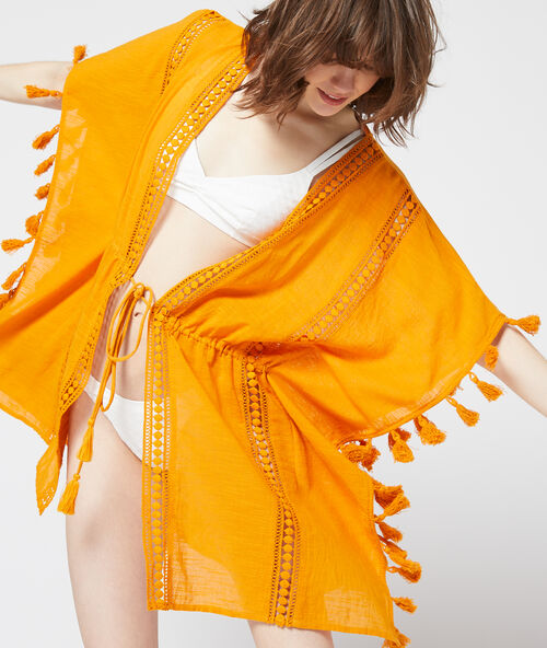 Katoenen strand tuniek met guipurekant curry.